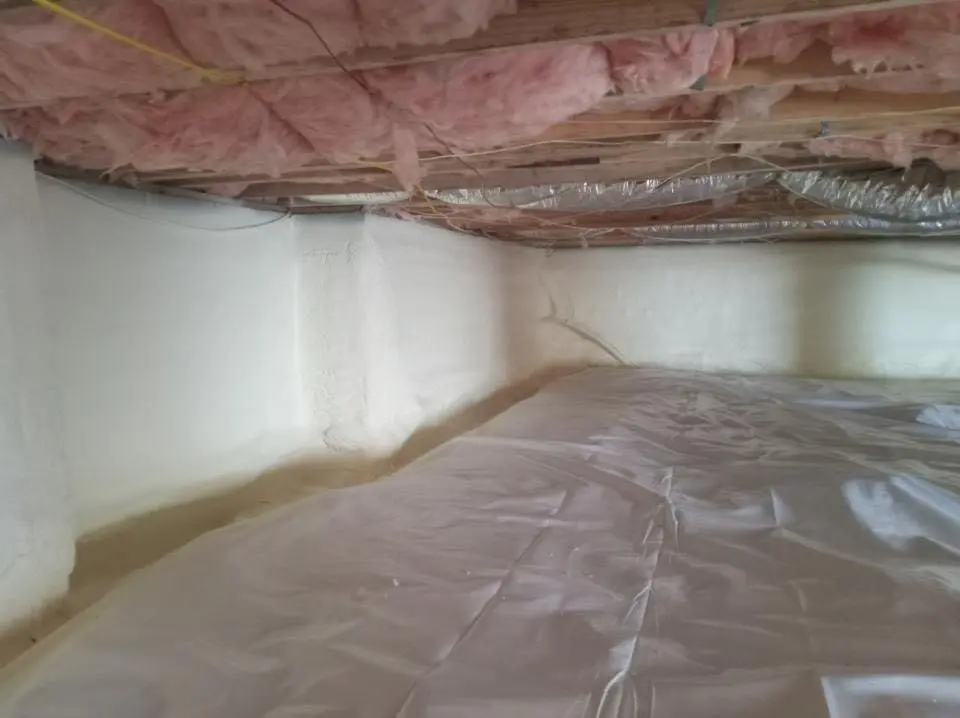 Crawl space encapsulation with closed-cell spray foam for Commercial Roof Restoration in Long Branch